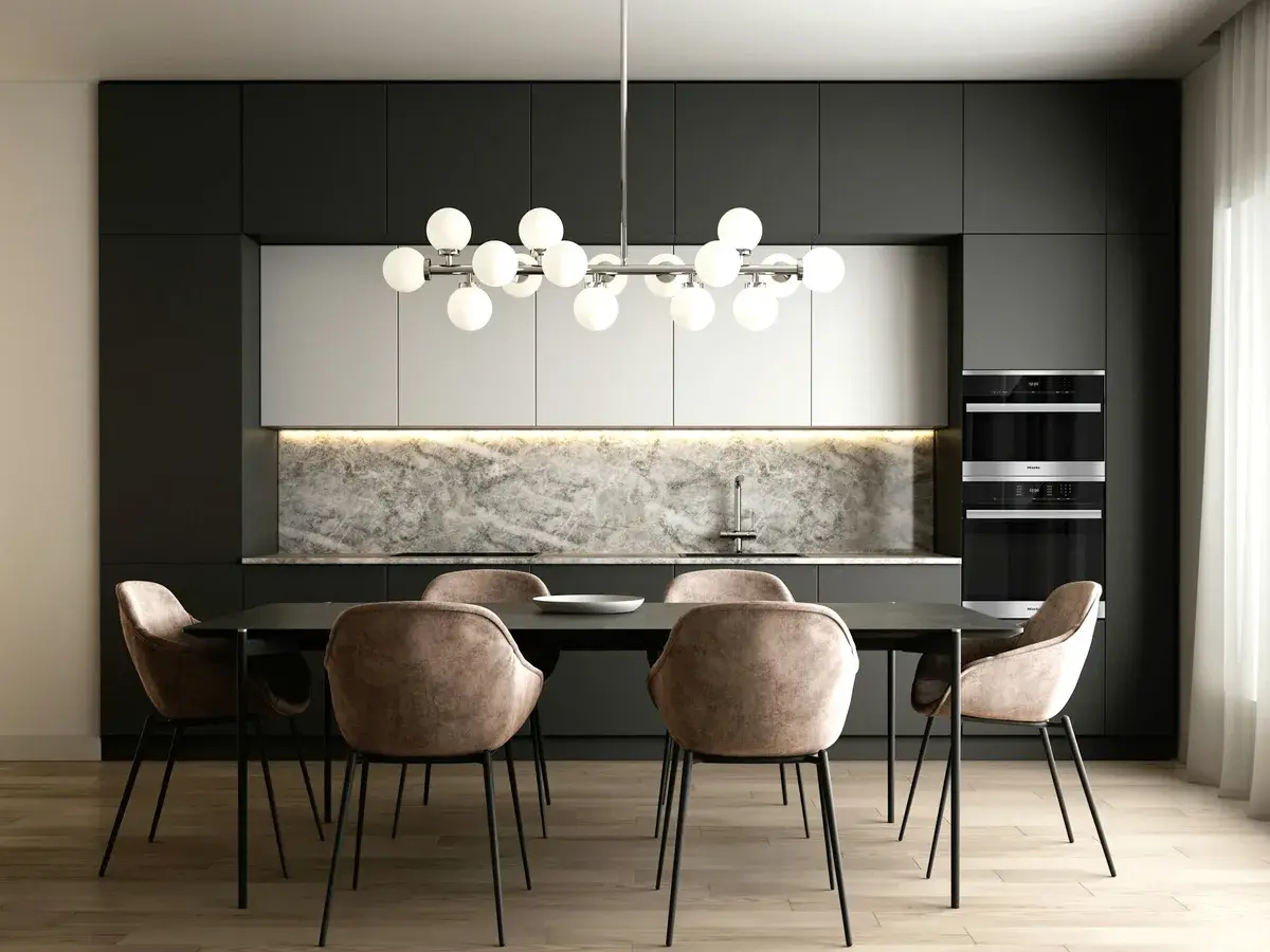 Dining area with marble backdrop and sculptural pendant lighting in Puppalaguda, Hyderabad
